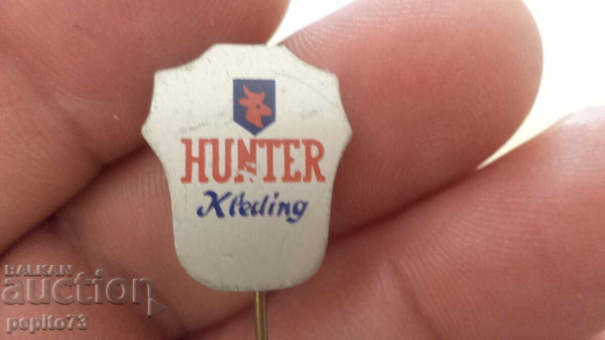 Semn publicitar, Hunter Kleding, marcă de îmbrăcăminte