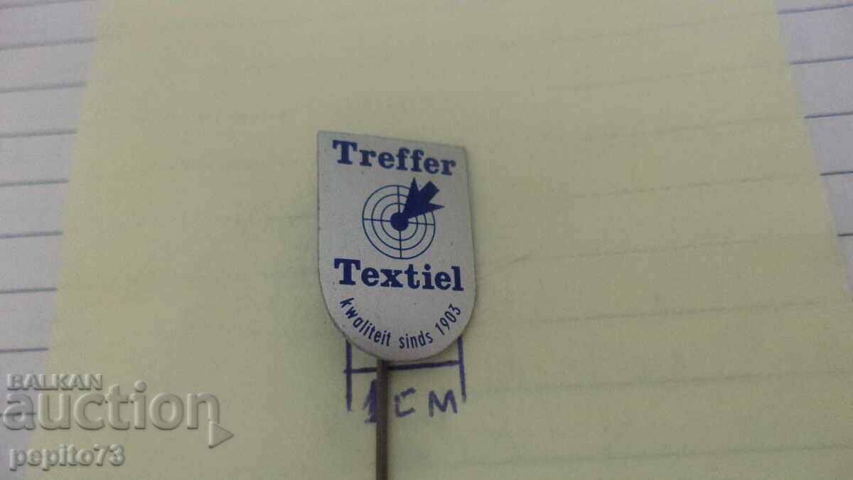 Znachka reklamna, Treffer Textiel, companie de textile cu preț € 1.00 | 1.96 BGN