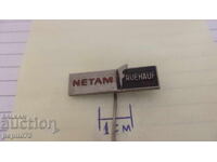 Semn publicitar, Netam Fruehauf, marcă remorcă