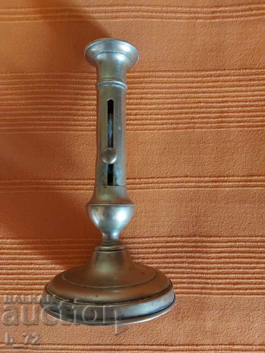 Χάλκινο κηροπήγιο με μηχανισμό για το κερί