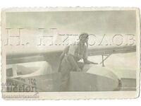 Small old photo airport motorless airplane pilot J282