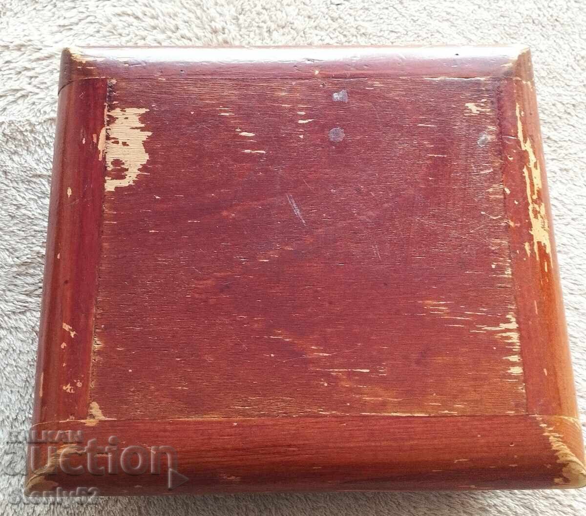 Delivery of Very old wooden box with wood carving