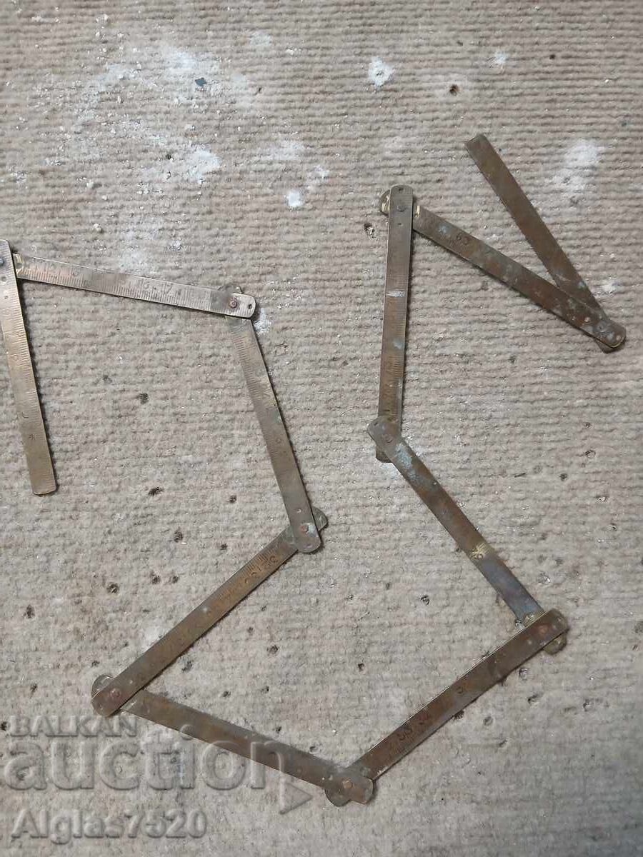 Vechi, bronz, metru pliant de dulgher