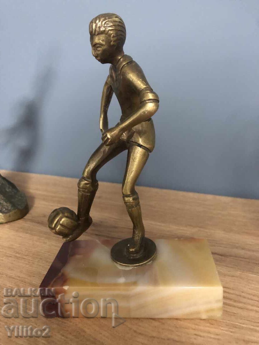 Παράδοση Χάλκινη φιγούρα