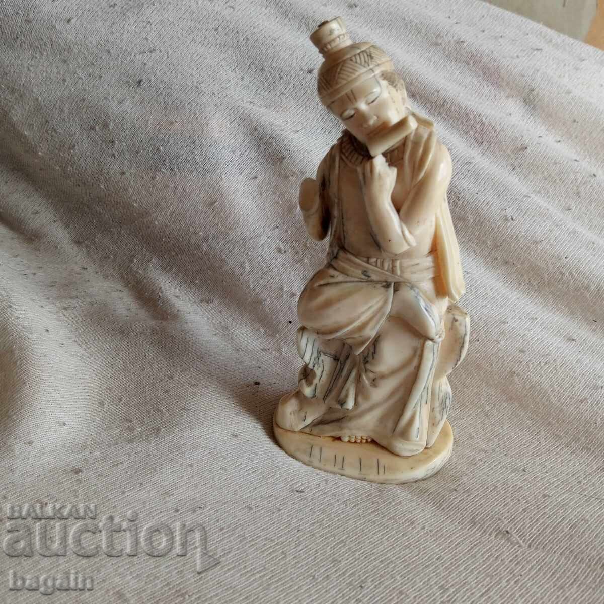 Walrus tusk figurine.