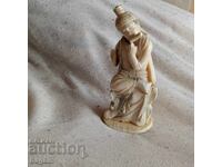 Ειδώλιο με χαυλιόδοντα θαλάσσιου ίππου.