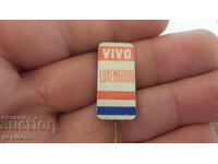 Advertising badge, VIVO Luxembourg, commercial organization