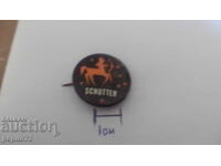 Διαφημιστικό σήμα, Schutter, σκοπευτής