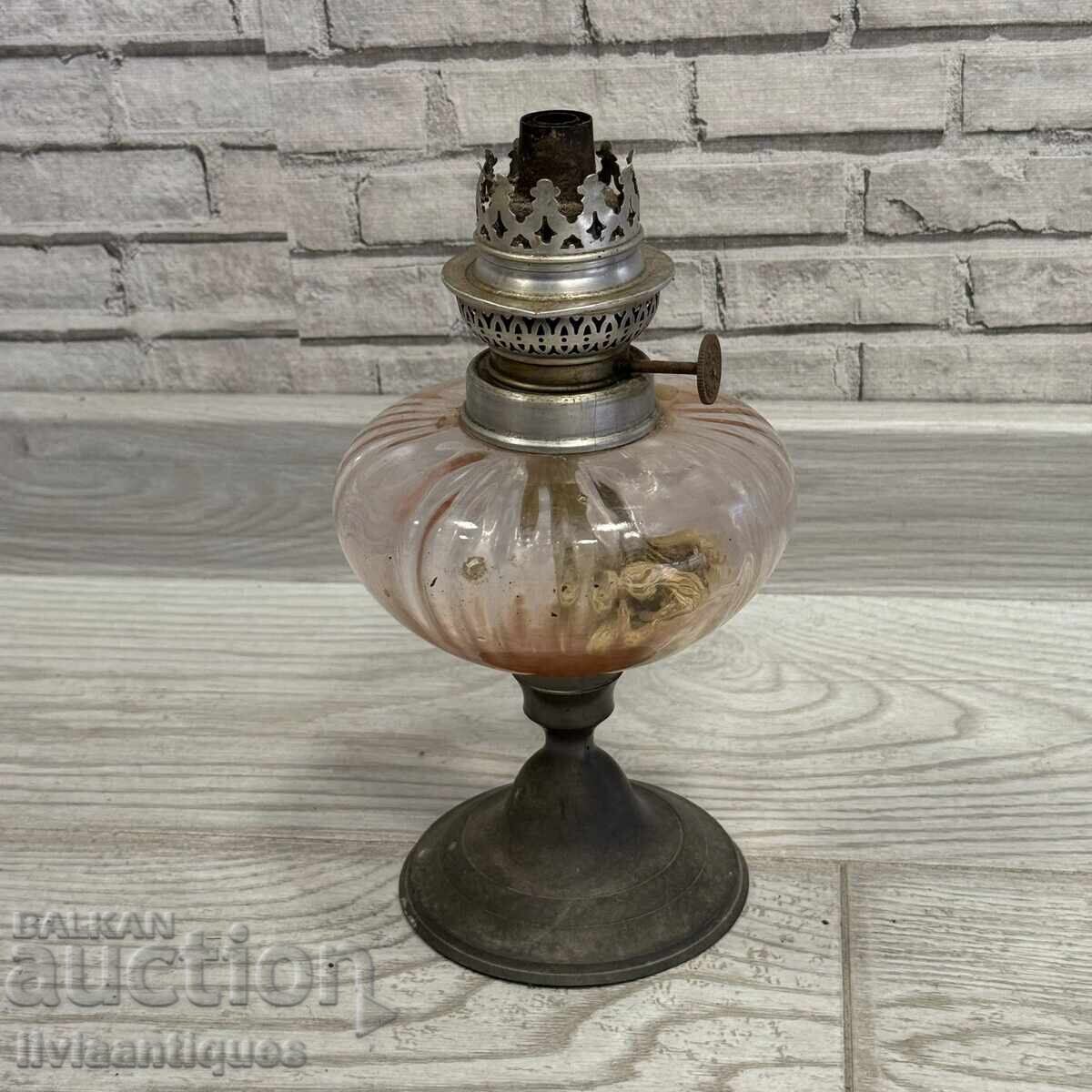 Elegant table lamp with ribbed glass body and metal base