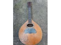 Old wooden mandolin