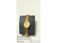 Дамски позлатен часовник Tissot  работи отлично