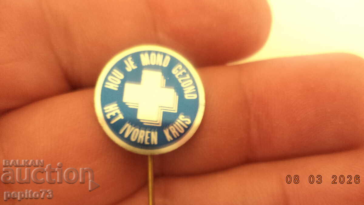 Advertising badge, Net Ivoren Kruis, dental hygiene