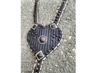 Horse breastplate with buckle