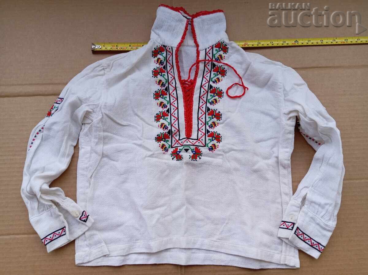 Embroidered small shirt (blouse) with traditional costume elements