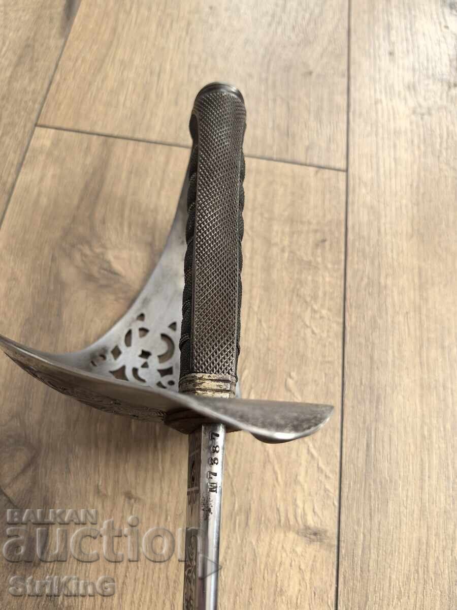 Auction  English saber with engraved blade