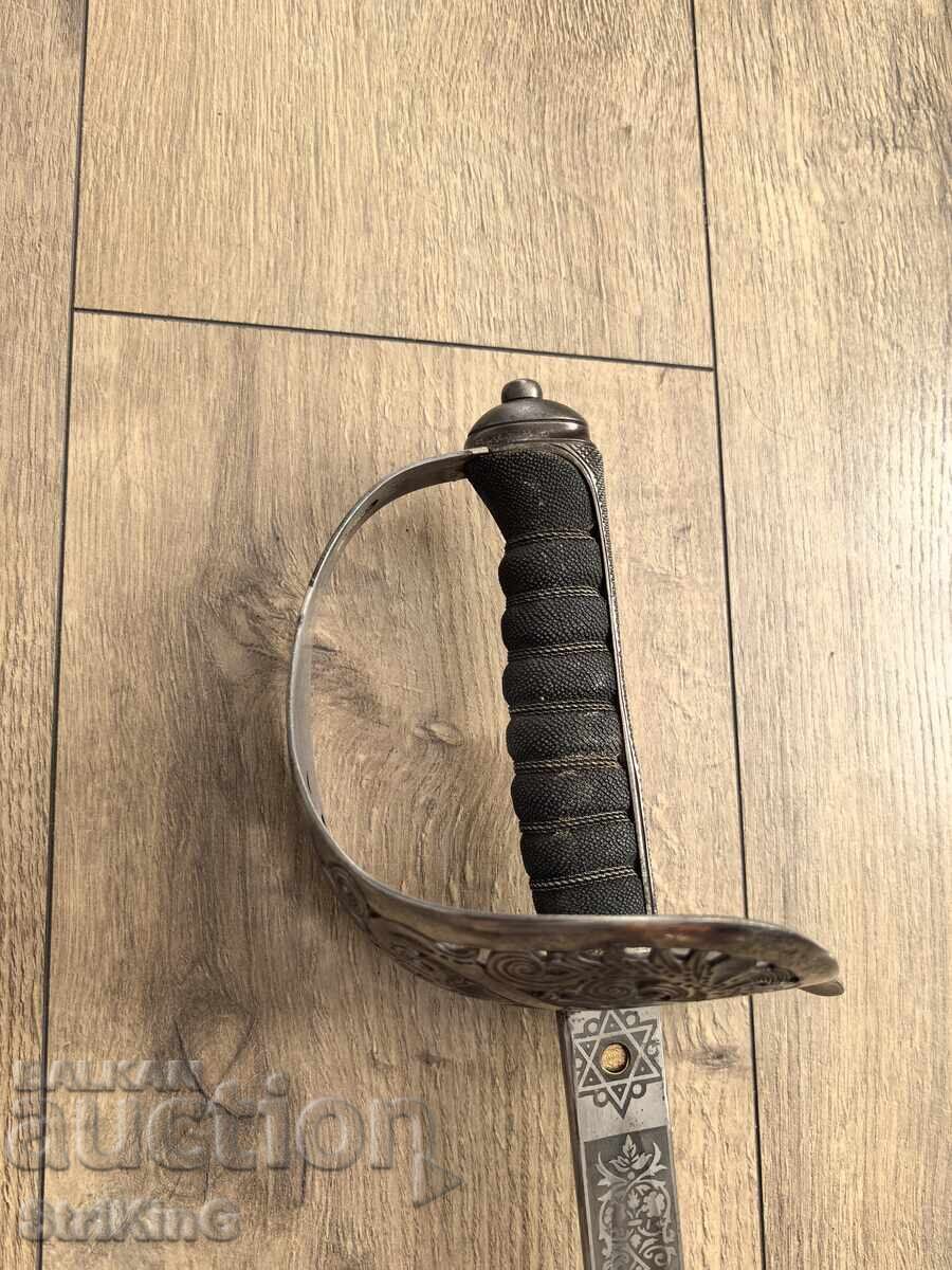 English saber with engraved blade