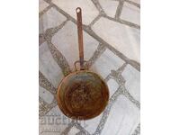 Old copper pan