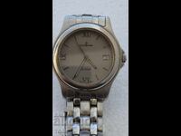 CANDINO SWISS MADE QUARTZ SAPPHIRE RARE I DON'T KNOW IF IT WORKS