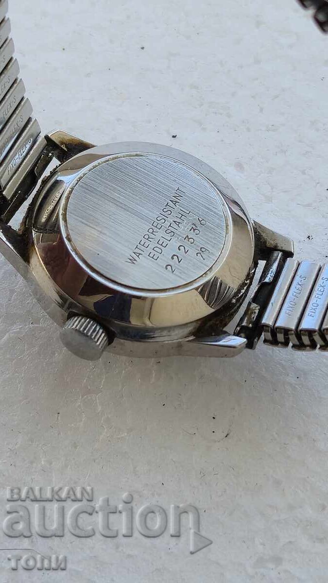 Delivery of DUGENA AUTOMATIC SWISS MADE RARE DOES NOT WORK BZTS !!!!