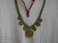 Old necklace with pendants for folk costume