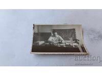 Φωτογραφία Άνδρας πίσω από γραφείο