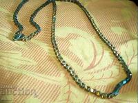 Vechi colier elegant argintat cu pandantiv cu cristale