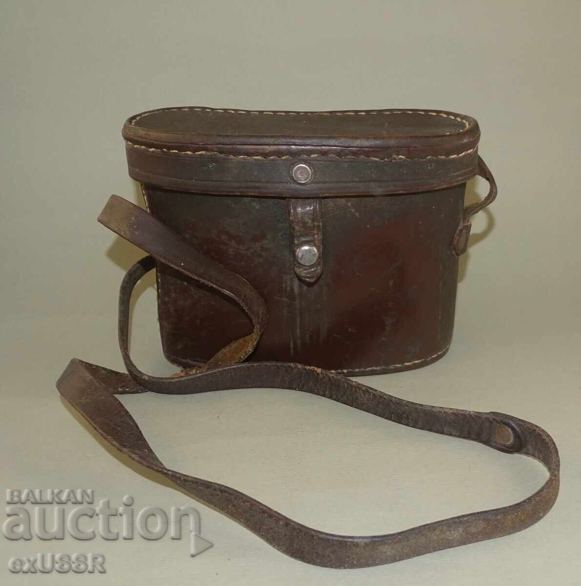 Old leather box case for binoculars