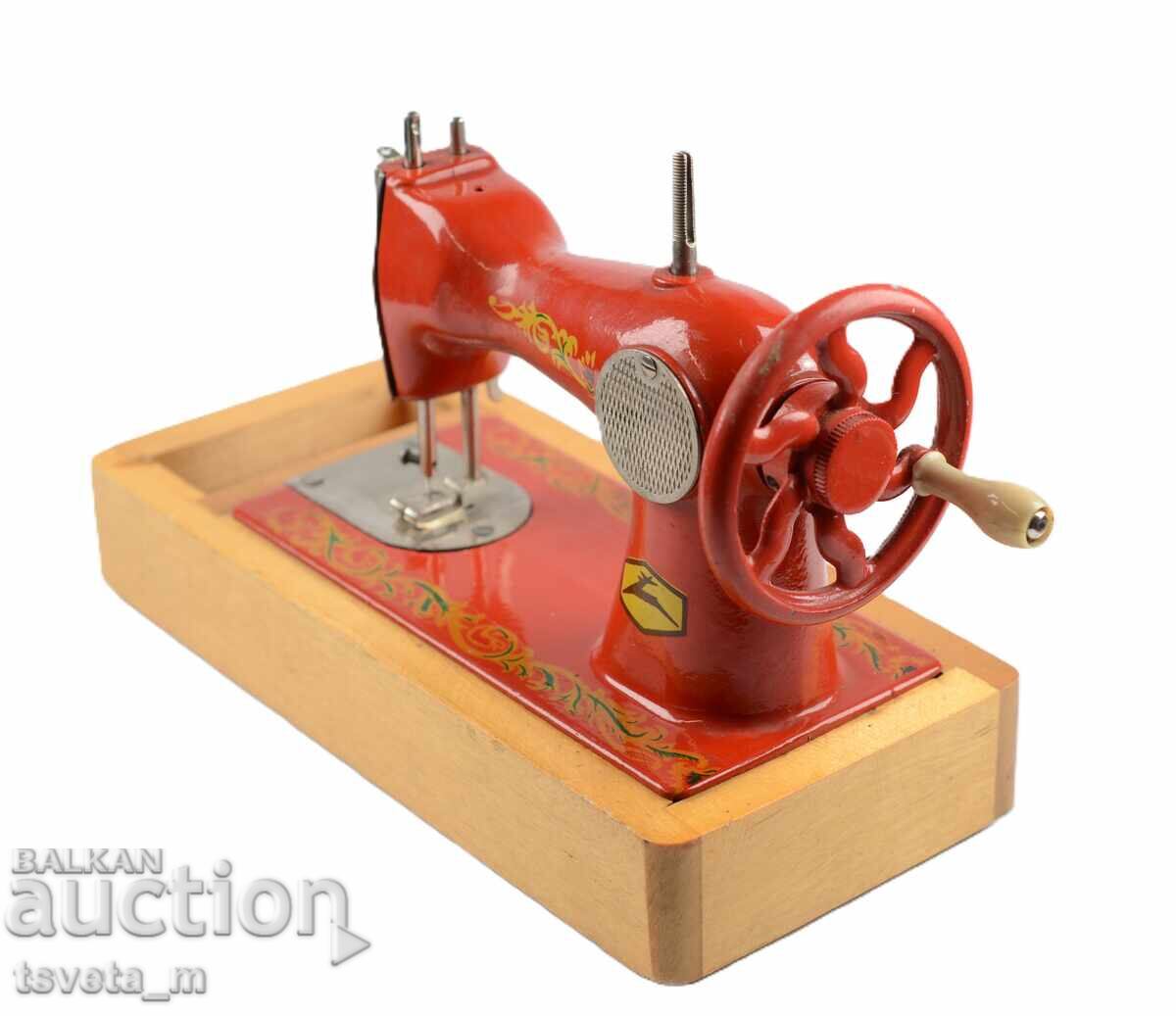 Delivery of Vintage children's sewing machine USSR