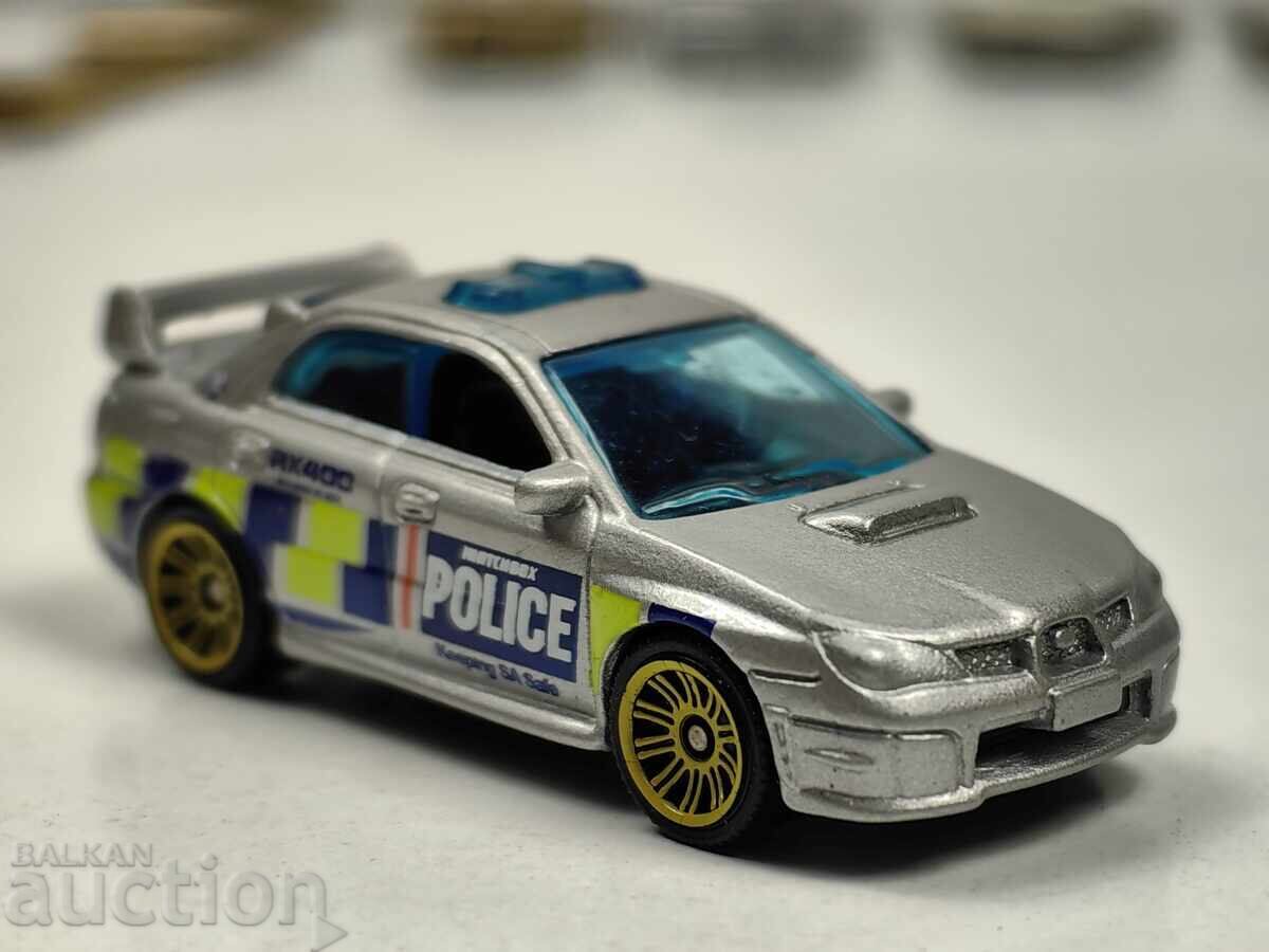 CĂRUCIOR METALIC MATCHBOX M0061 SUBARU IMPREZA