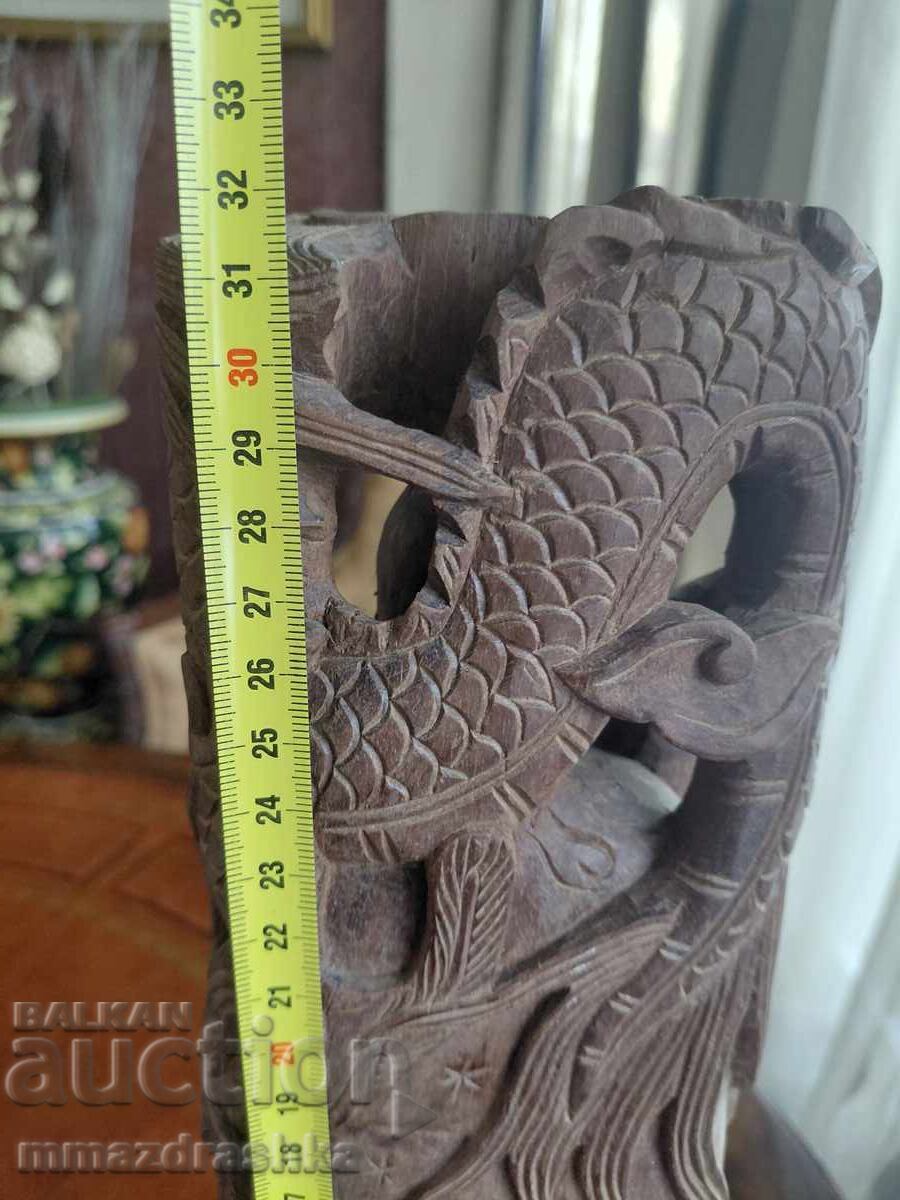 Livrarea Statuetă din lemn, sculptată în lemn