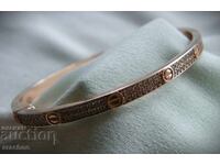 Excelentă copie a brățării Cartier din aur