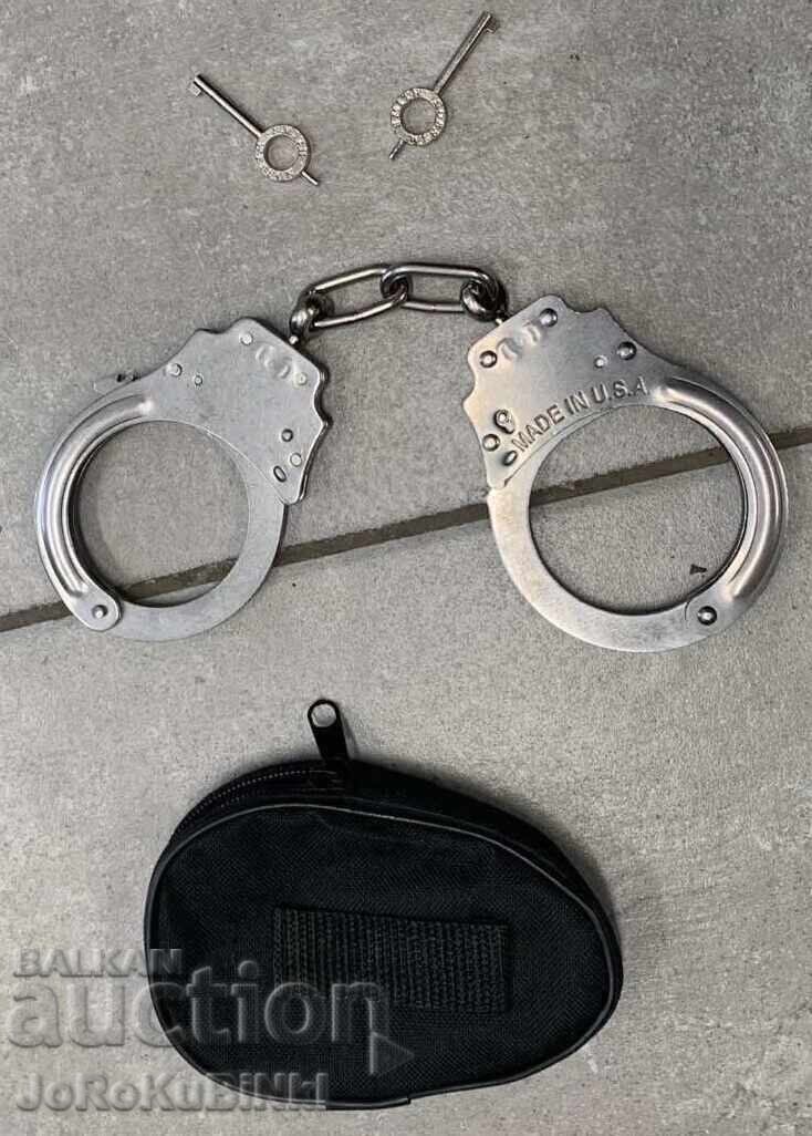 Nouă pereche de cătușe