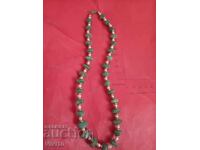 Antique necklace of green aquamarine