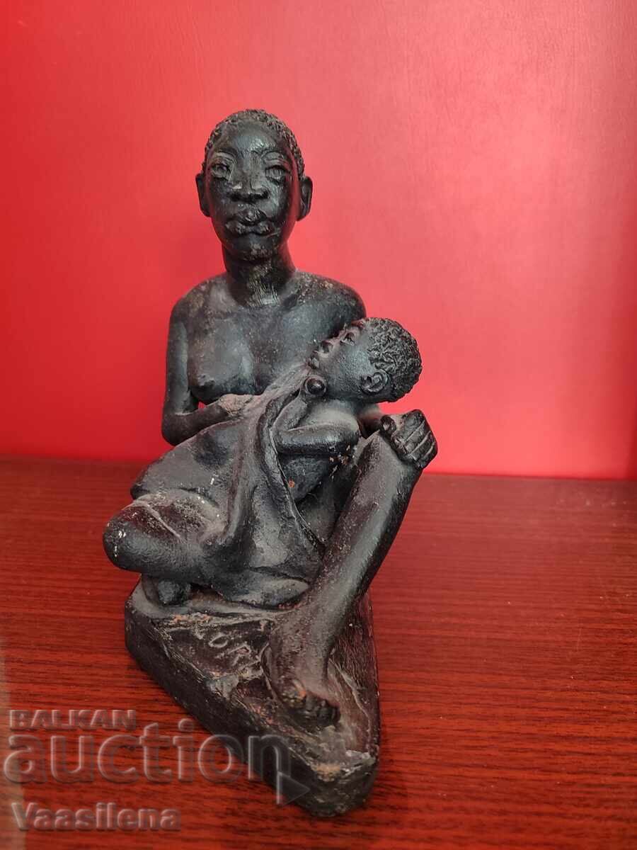 Statue woman with child Statue woman with child