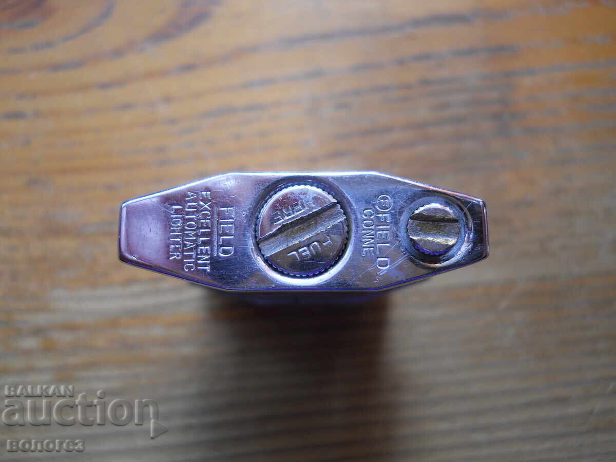 Livrarea Brichetă vintage pe benzină "Field Conne"