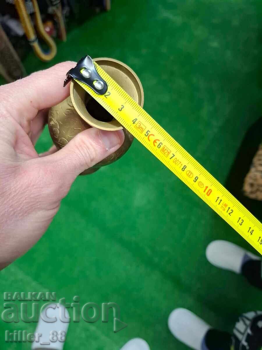 Delivery of Old bronze vase with engravings India