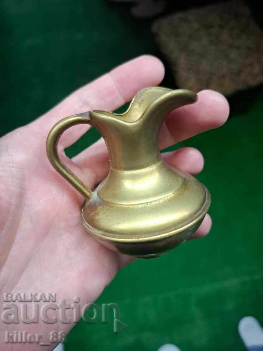 Auction  Small jug quite heavy for its size