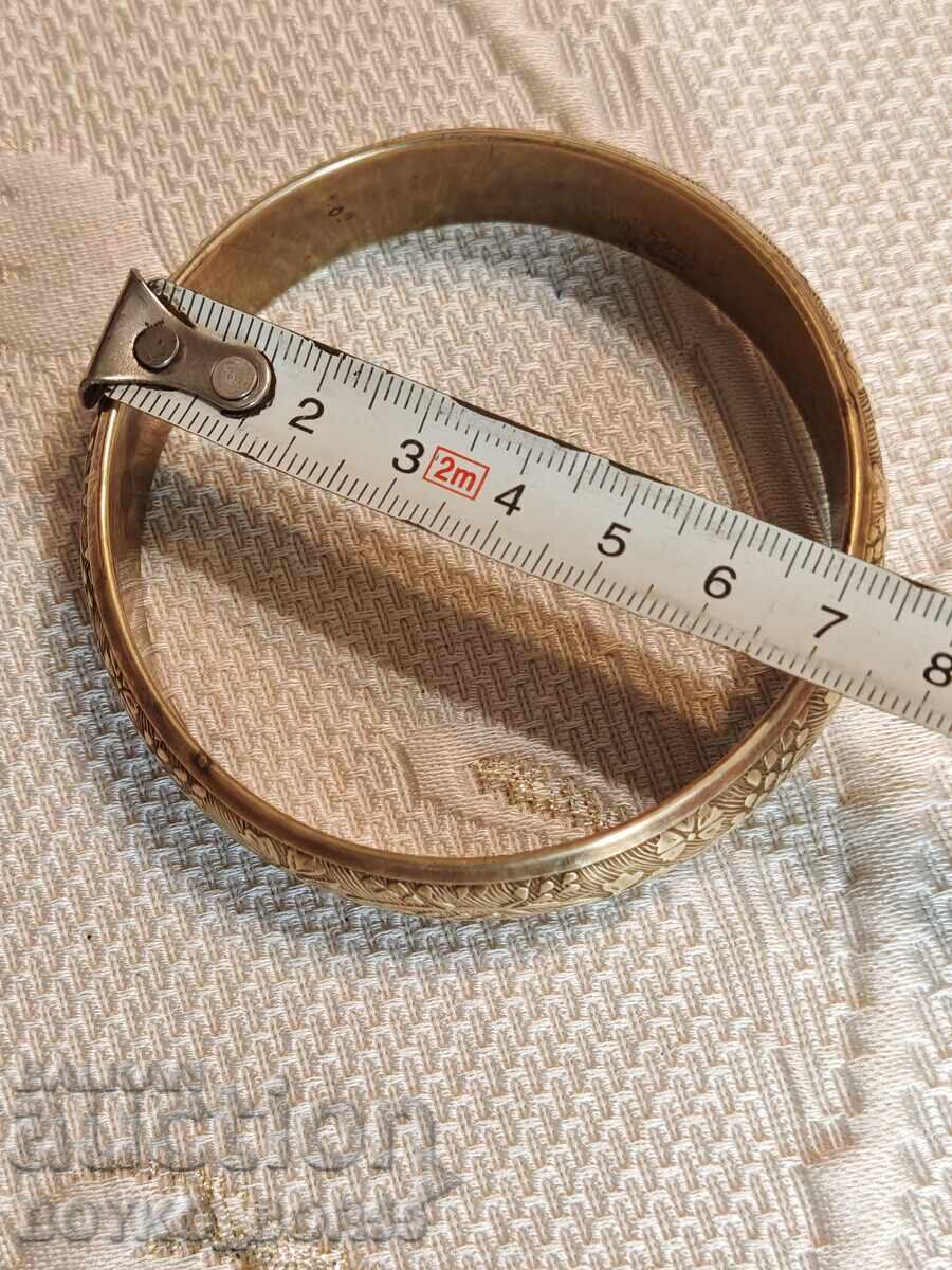 Delivery of Old Bronze Bracelet with Ornaments