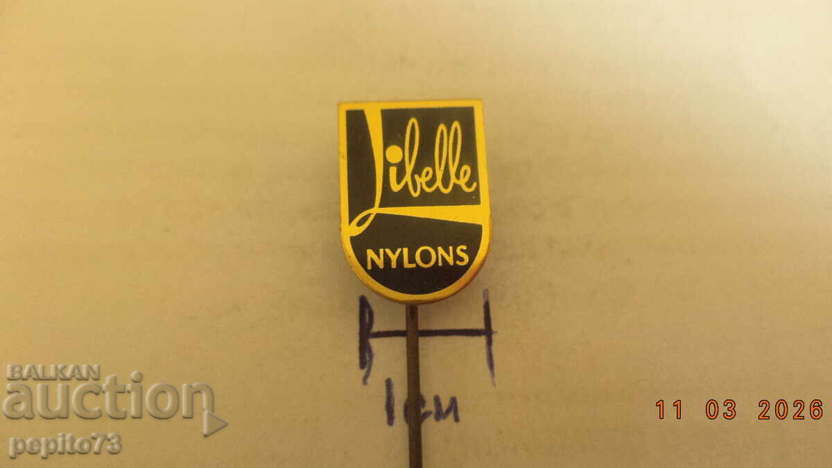 Insignă publicitară, Libelle Nylons, marcă de ciorapi pentru femei