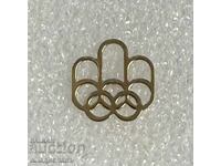 Olimpiĭska znachka Monreal 1976 - zhŭlt metal