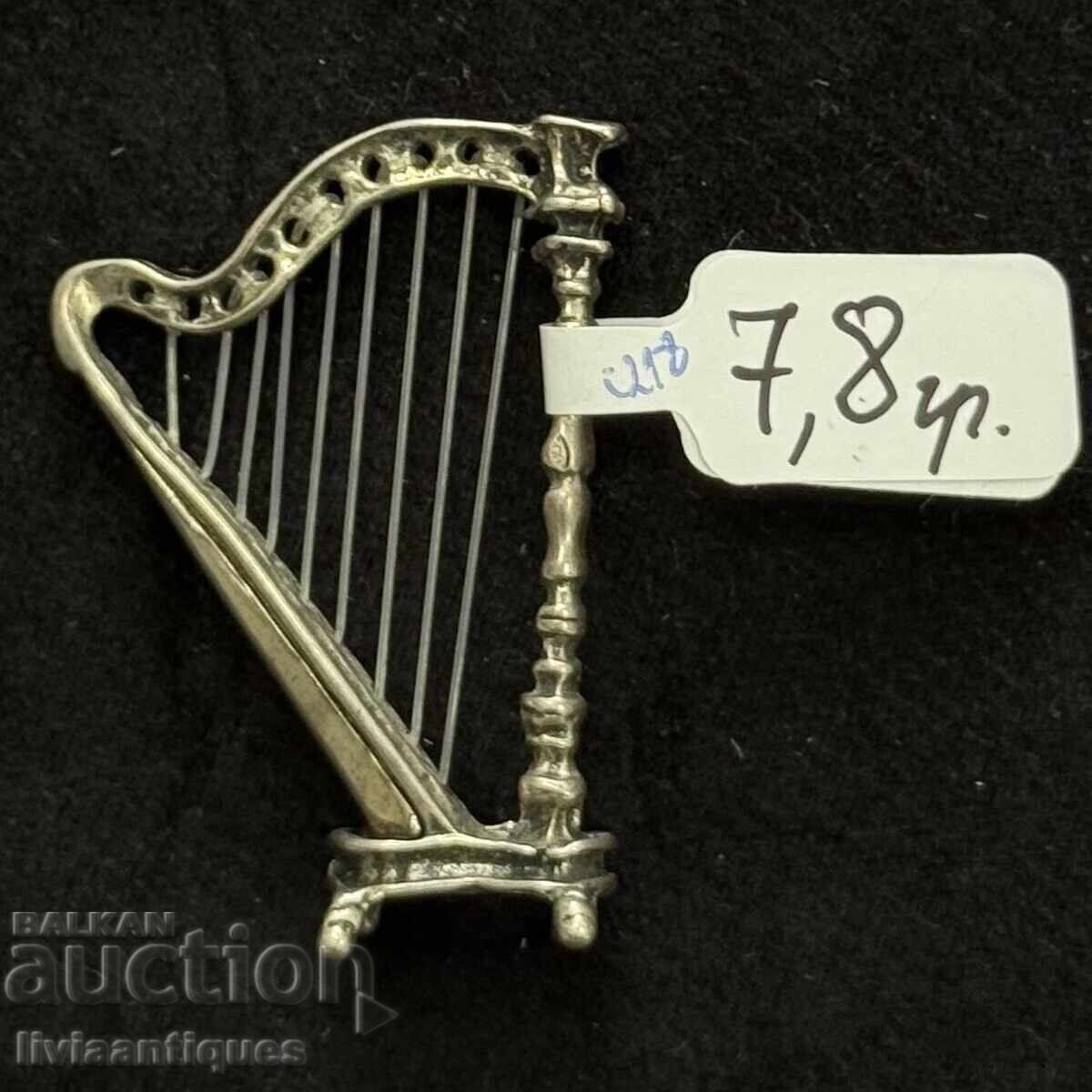 Miniature silver figurine in the shape of a harp