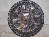 Old hammered copper wall panel