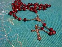 Necklace with a cross of pearls