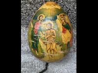 Wooden painted egg with religious motifs