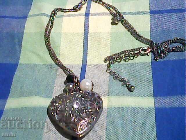 Beautiful old necklace and hearts