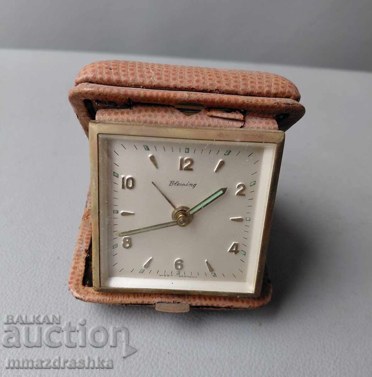 Blessing Tourist Alarm Clock