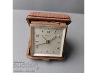 Blessing Tourist Alarm Clock