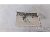 Φωτογραφία Νεαρή γυναίκα στην παραλία