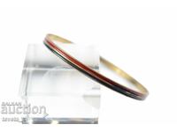 Brățară din bronz cu incrustație colorată