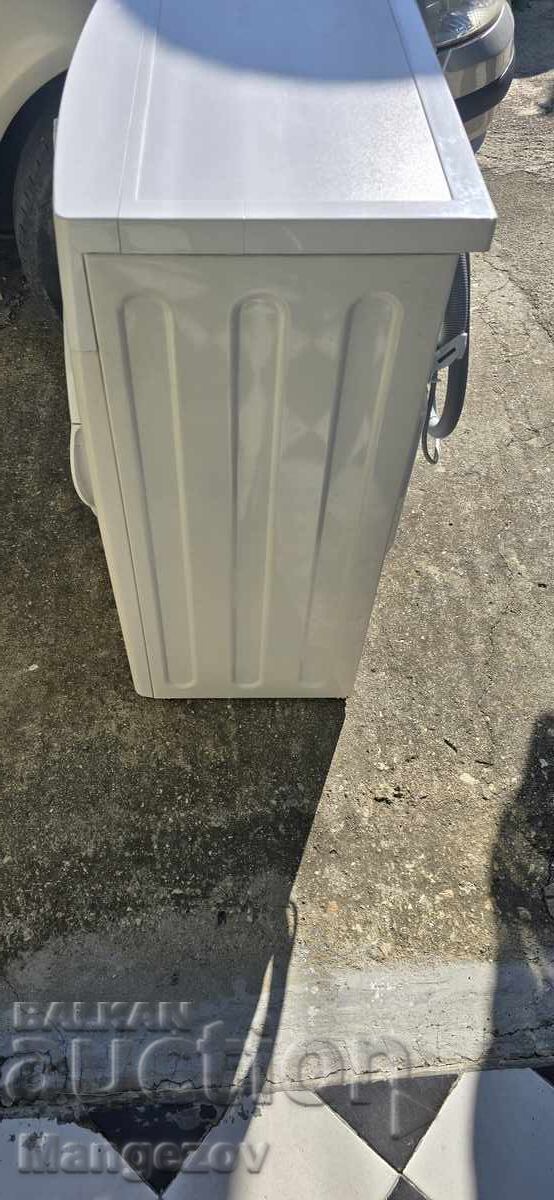 Auction  Daewoo slim washing machine. Torn door seal!